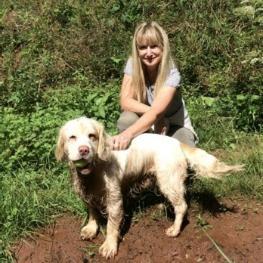 a picture of Claire Perks with her dog